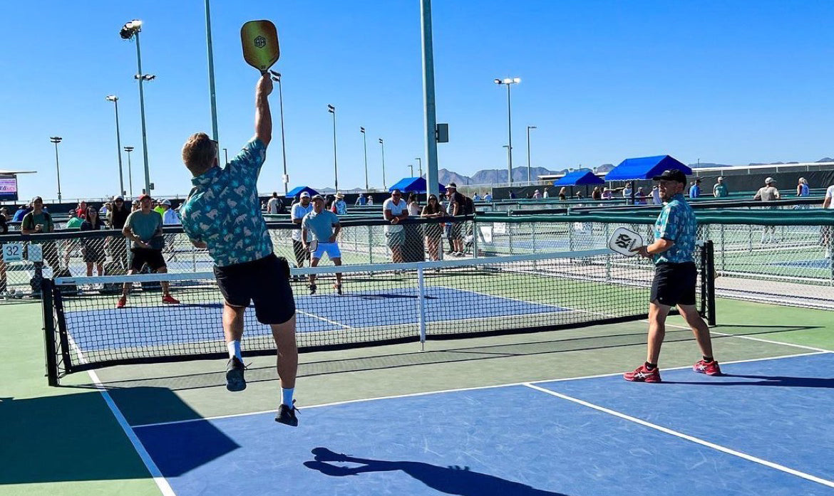 Pickleball Compression Sleeves Homepage Banner playing on the court.